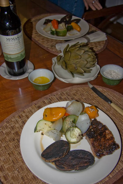 My birthday dinner used some of that Costco charcoal. Sliced potatoes and vegetables grilled on a fire with a bit of meat, an artichoke, and an excellent bottle of McManis cabernet.  And so it goes until next year.