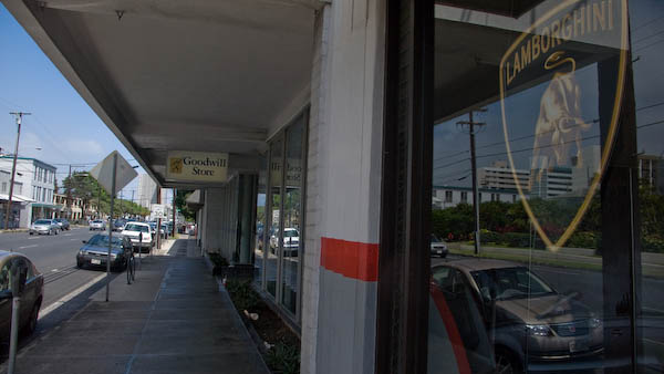 Across the street, would it be the Lamborghini showroom or the Goodwill Store?